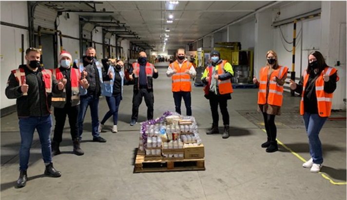 Lineage Logistics workers participating in Holidays without Hunger in Heywood, UK