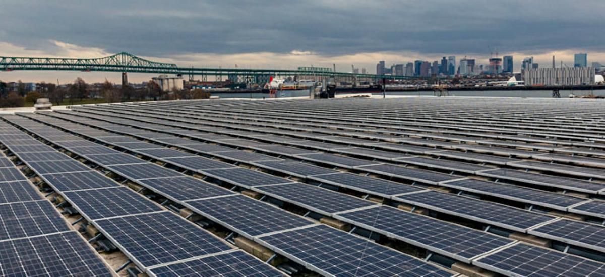 Lineage cold storage warehouse facility with array of solar panels.