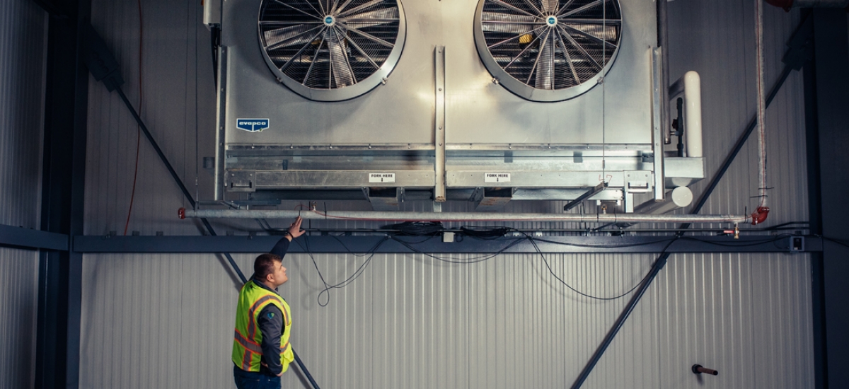 man checking energy equipment