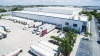 Aerial image of a Lineage facility with trucks in parking lot